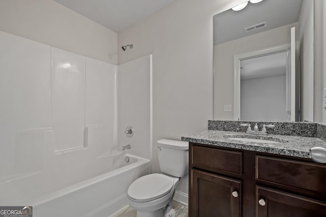 full bathroom featuring vanity, shower / bathtub combination, and toilet