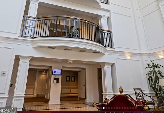 entrance to property featuring a balcony