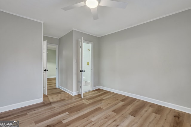 unfurnished bedroom featuring ceiling fan, crown molding, and light hardwood / wood-style flooring