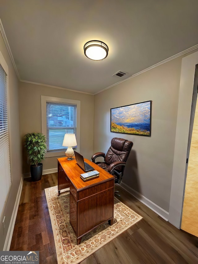 home office featuring dark hardwood / wood-style flooring and crown molding