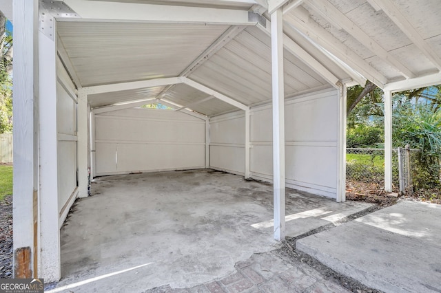 garage featuring a carport