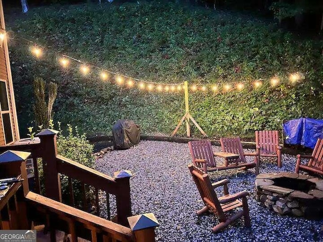 view of patio / terrace with a fire pit