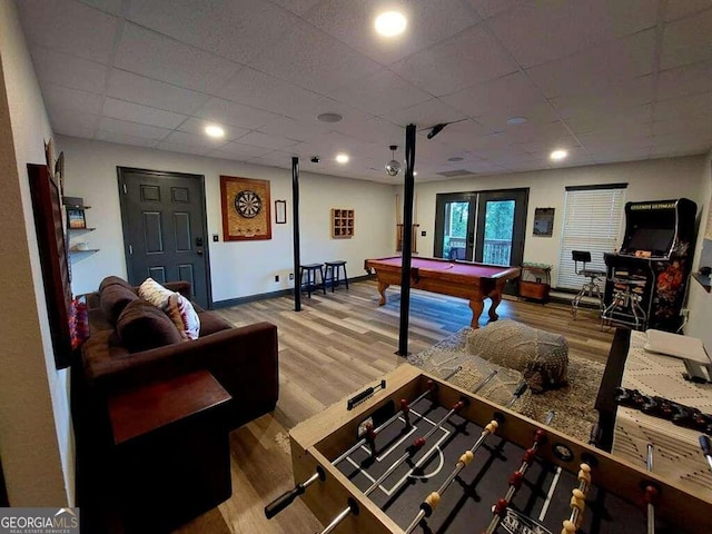 game room featuring a drop ceiling, wood-type flooring, billiards, and french doors