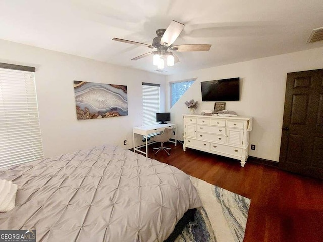 bedroom featuring wood-type flooring and ceiling fan