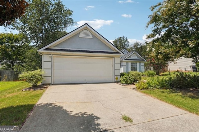 single story home with a front lawn and a garage