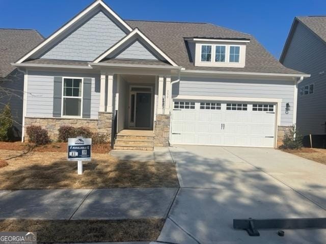 craftsman-style home with a garage