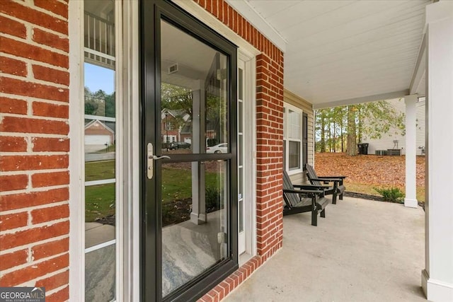 view of patio featuring a porch