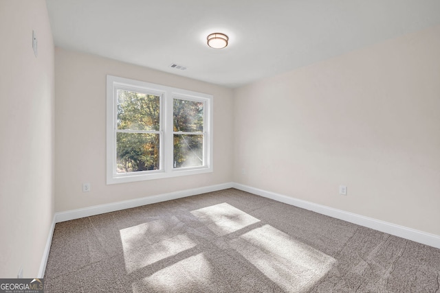 view of carpeted spare room