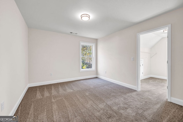 view of carpeted spare room