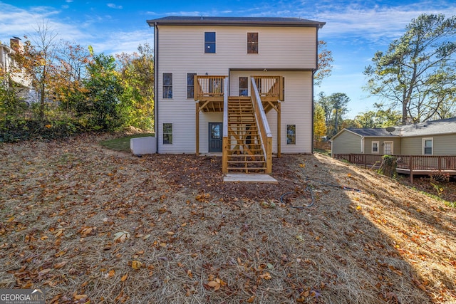 rear view of property with a deck