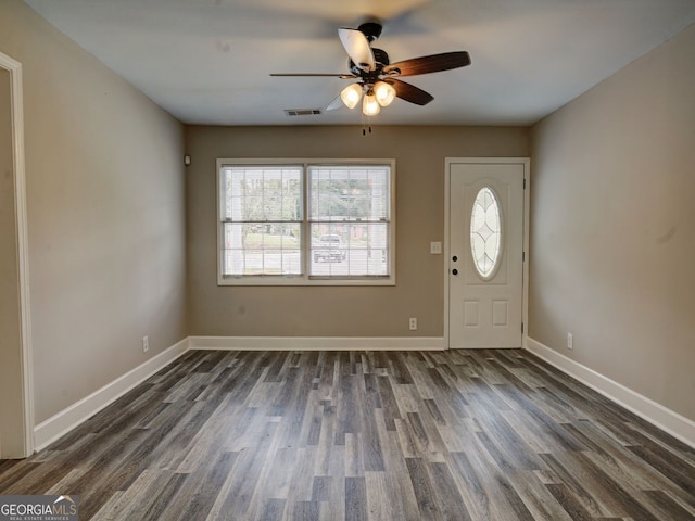 foyer entrance featuring dark hardwood / wood-style flooring and ceiling fan