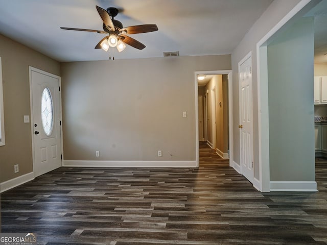 entrance foyer featuring dark wood-type flooring and ceiling fan