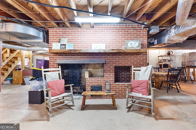 basement with a brick fireplace