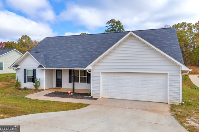 ranch-style home featuring a garage