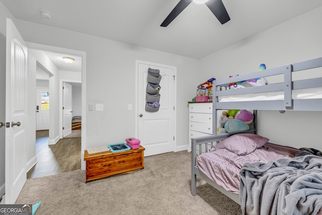 bedroom with hardwood / wood-style flooring and ceiling fan