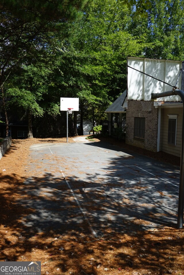 view of patio with basketball hoop