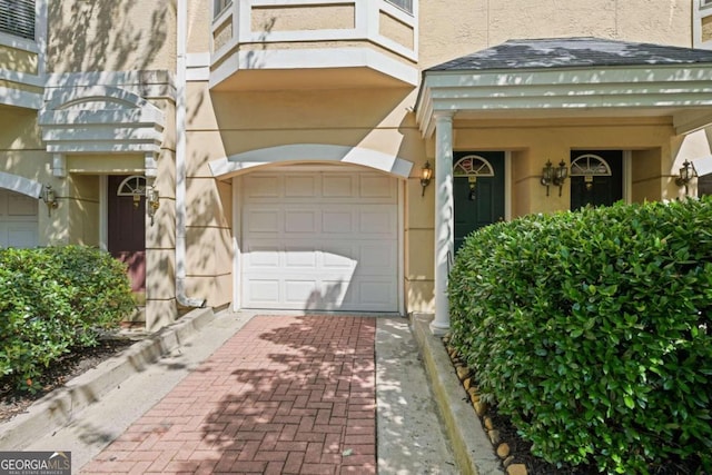 property entrance featuring a garage