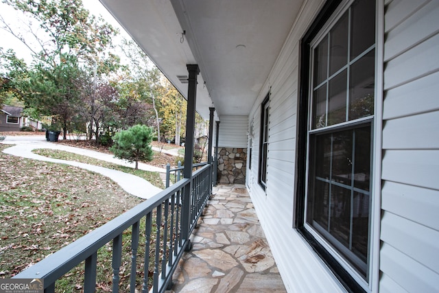 balcony featuring a porch