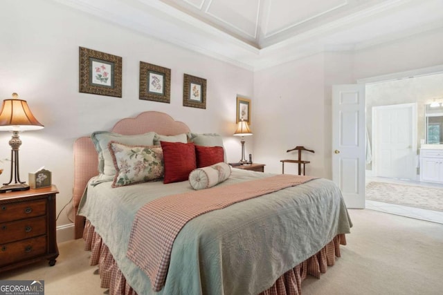 bedroom with light colored carpet, ensuite bath, and ornamental molding