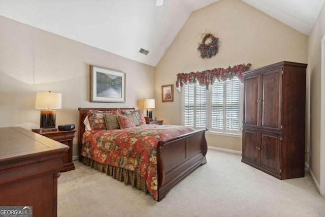 bedroom featuring visible vents, ceiling fan, baseboards, light carpet, and high vaulted ceiling