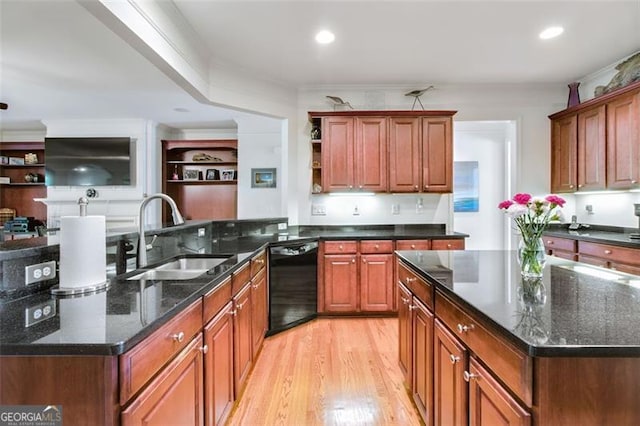 kitchen featuring black dishwasher, sink, crown molding, light wood-type flooring, and dark stone countertops