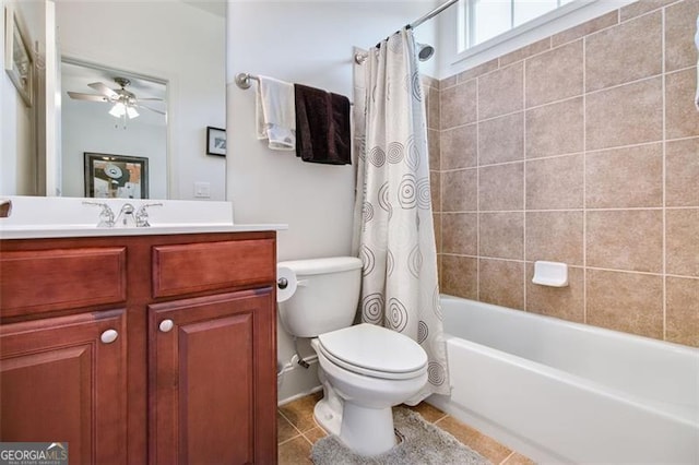 full bathroom with shower / bath combo with shower curtain, toilet, tile patterned flooring, vanity, and ceiling fan