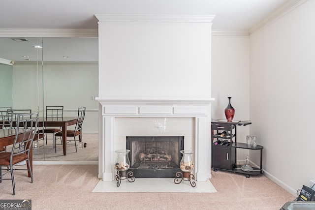 living room with ornamental molding and carpet flooring