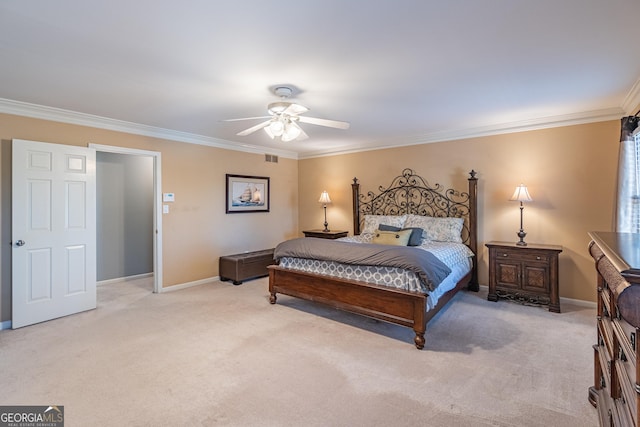 carpeted bedroom with crown molding and ceiling fan