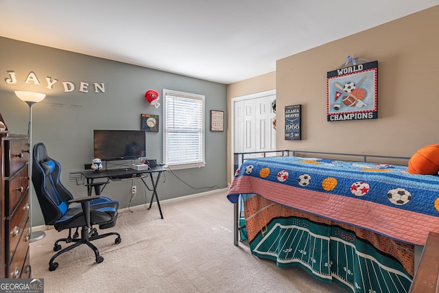 carpeted bedroom featuring a closet