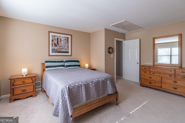 bedroom featuring light carpet