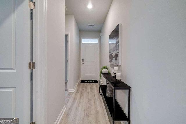 hall featuring light wood-type flooring