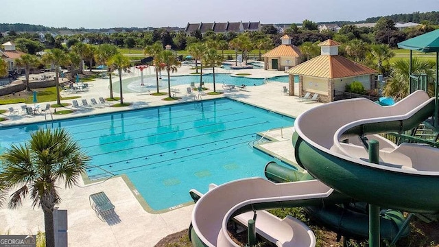 view of swimming pool featuring a patio