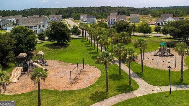 view of property's community featuring a playground