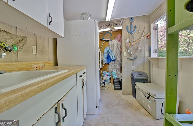 bathroom with concrete floors