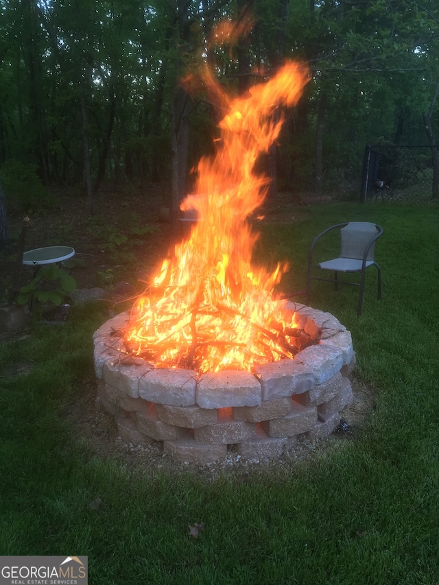 exterior details featuring a fire pit