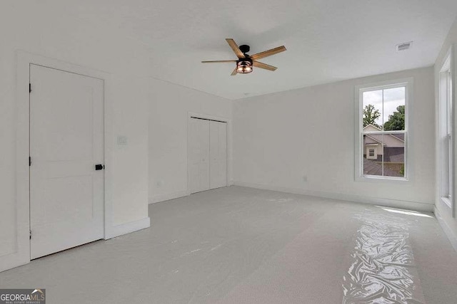 spare room with ceiling fan