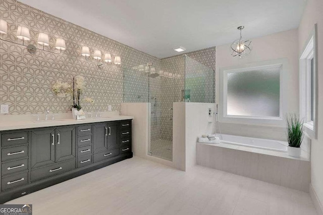 bathroom with vanity and plus walk in shower