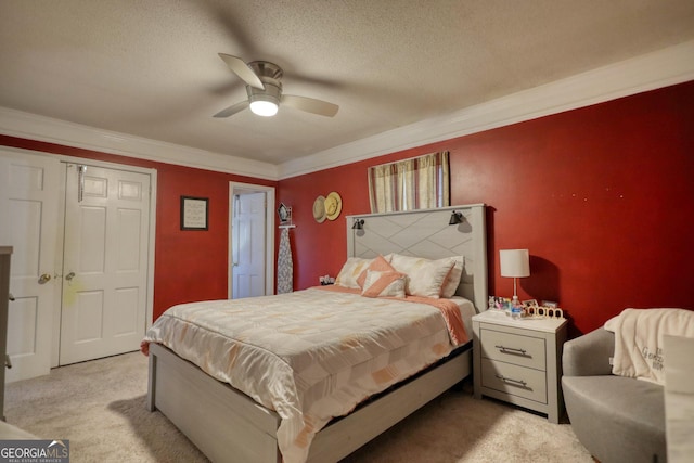 bedroom with ceiling fan, crown molding, light carpet, and a textured ceiling