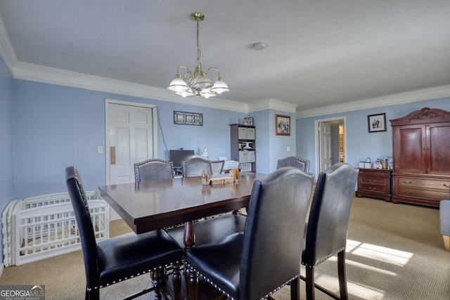 carpeted dining space with crown molding and an inviting chandelier