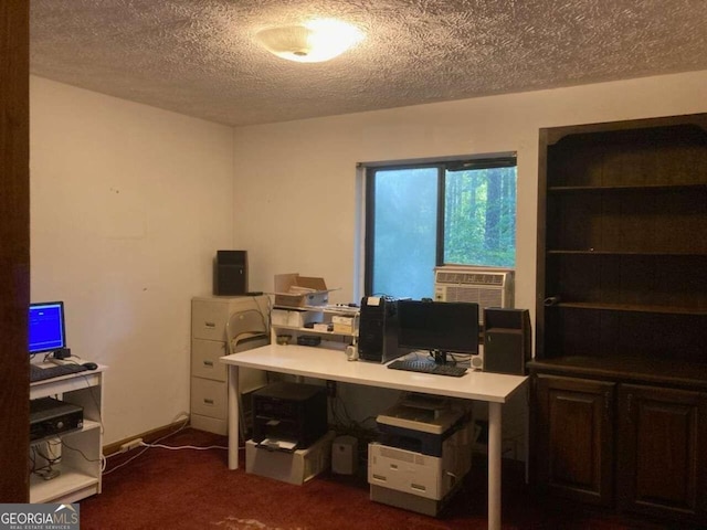 office space with dark colored carpet, cooling unit, and a textured ceiling