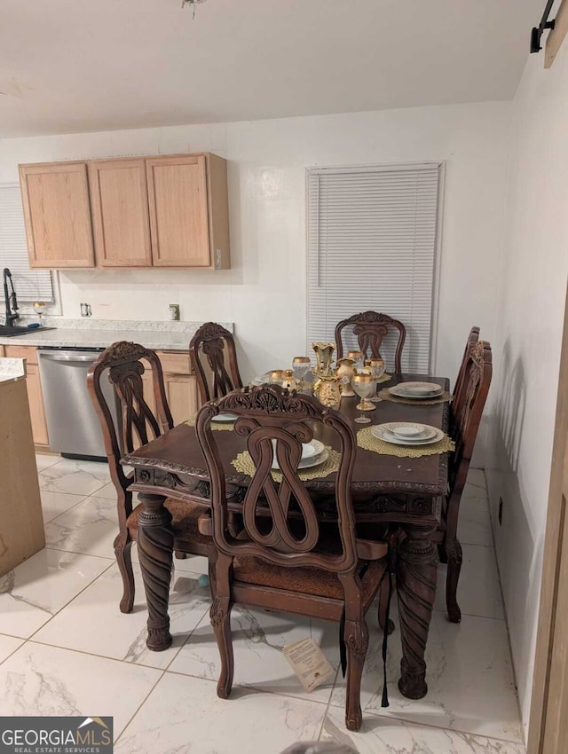 dining room featuring sink