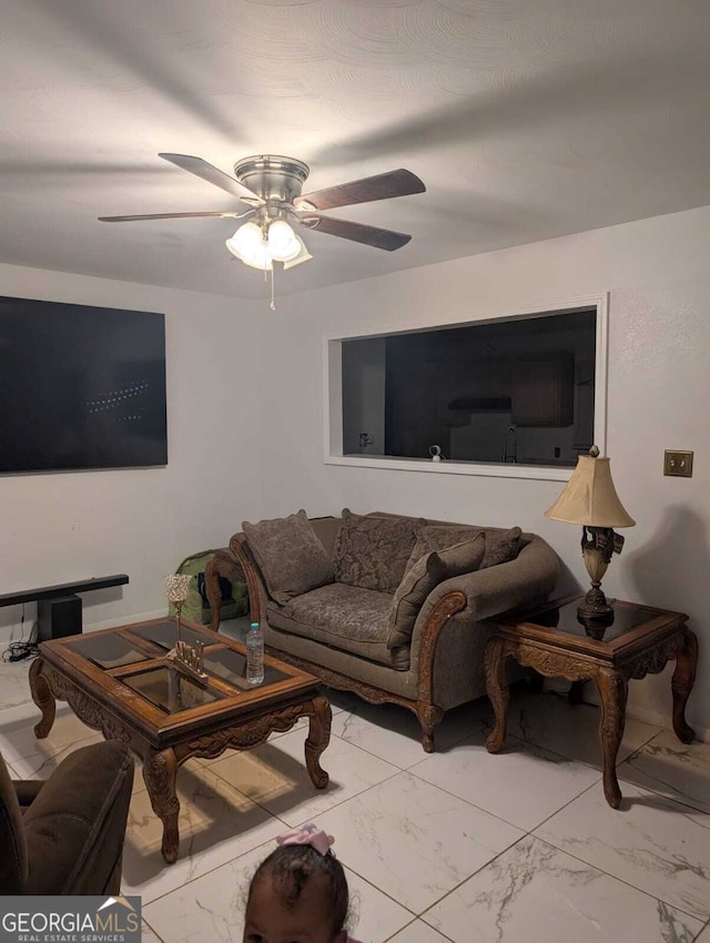 living room with ceiling fan