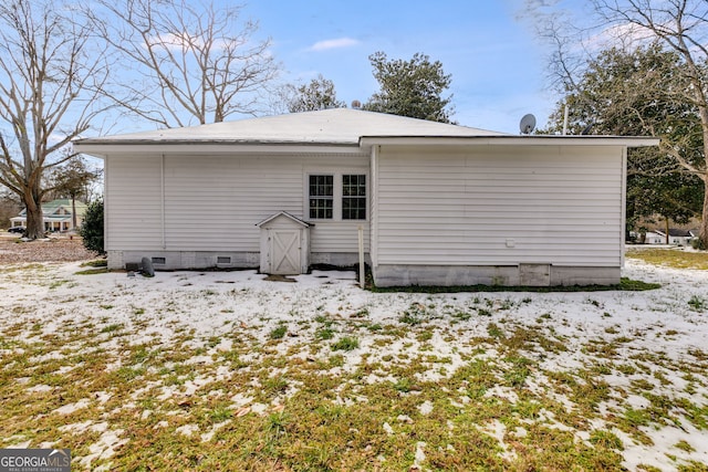 view of snow covered property