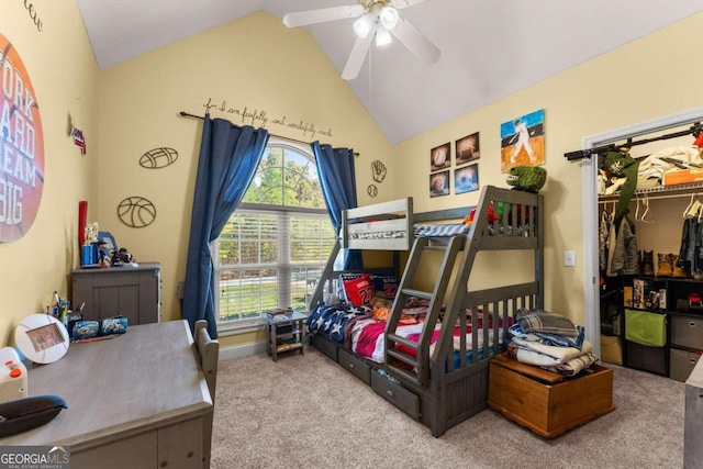 bedroom with ceiling fan, vaulted ceiling, and carpet