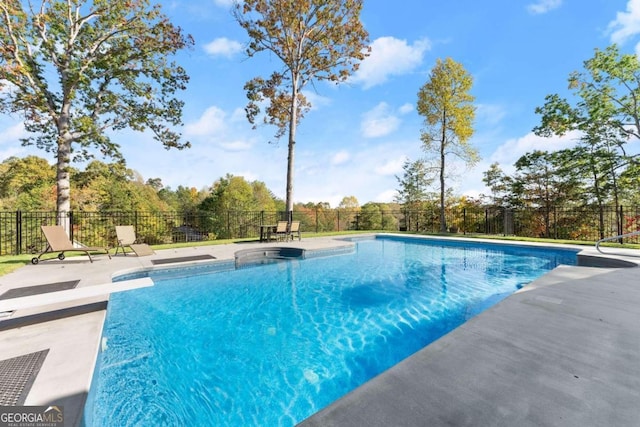 view of swimming pool featuring a diving board and a patio