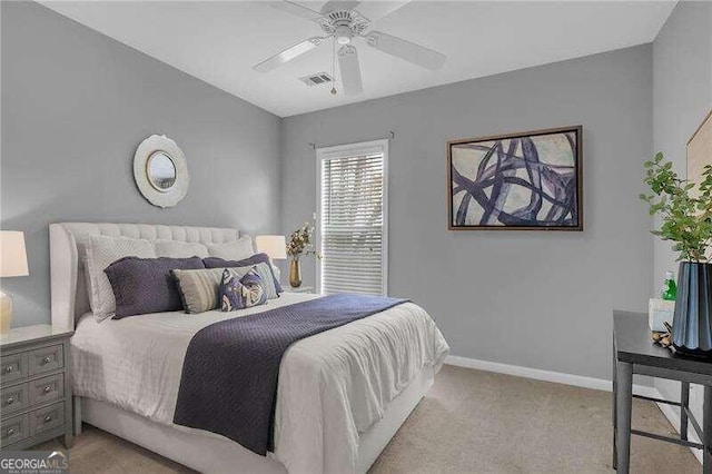 carpeted bedroom featuring ceiling fan