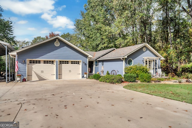 single story home featuring a garage and a front yard