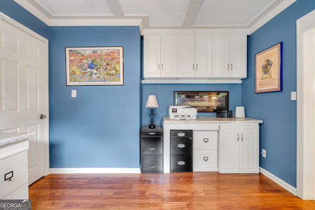 bar featuring white cabinets, light stone countertops, light hardwood / wood-style flooring, and ornamental molding