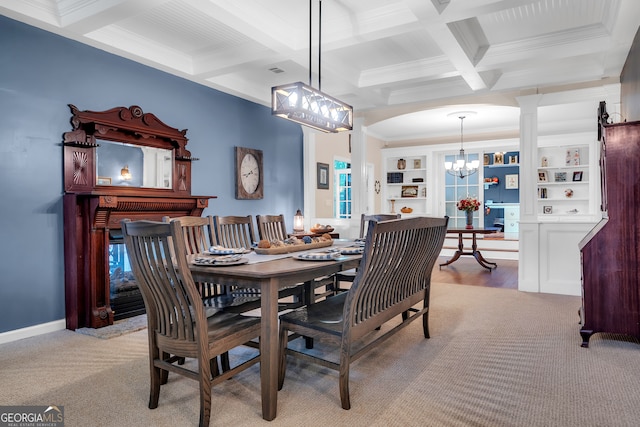 dining area with built in shelves, crown molding, beam ceiling, an inviting chandelier, and light hardwood / wood-style flooring