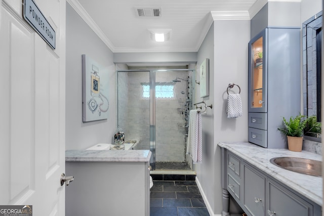 bathroom with vanity, tile patterned flooring, ornamental molding, and a shower with shower door